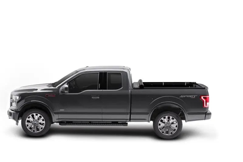Gray four-door pickup truck with Truxport Bed Cover for Ford F-150