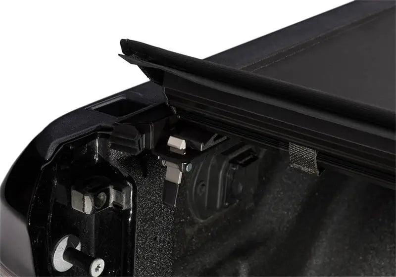 Black truck bed cover.