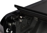 Black truck bed cover.
