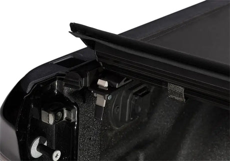 Black truck bed cover.
