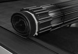 Retractable Sentry tonneau cover in black with vinyl fabric, partially rolled up