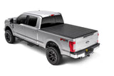 Silver Ford F-series pickup with black tonneau cover and running boards, Sentry tonneau cover in vinyl fabric