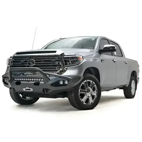 Silver Toyota Tundra pickup truck with TT14-X3852-1 Fab Fours Matrix accessory