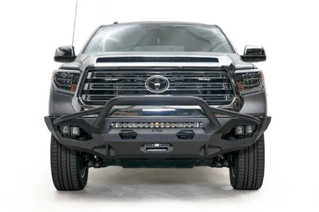 Black truck with Fab Fours aftermarket bumper for Toyota Tundra Matrix TT14-X3852-1