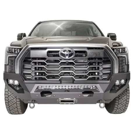 TT22-X5451-1 Fab Fours Matrix Bumper installed on Toyota vehicle, showcasing durable construction and sleek design for superior protection.