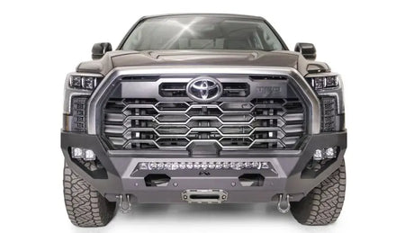 Front view of a Toyota truck equipped with the TT22-X5451-1 Fab Fours Matrix Bumper featuring superior protection, durable construction, and sleek design.