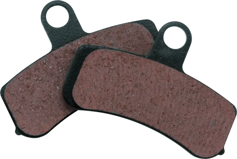 Two brown organic brake pads for Twin Power Softails and Dyna models