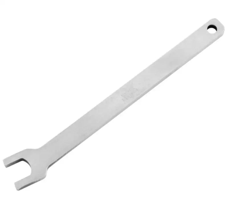 Silver-colored spanner wrench from Twin Power Tension Reliever product line