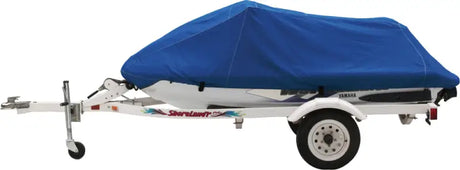 Ultratect Cover Kaw protecting personal watercraft on white trailer in blue tarp