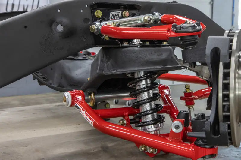 Red UMI Performance C10 CornerMax A-arm kit with black springs