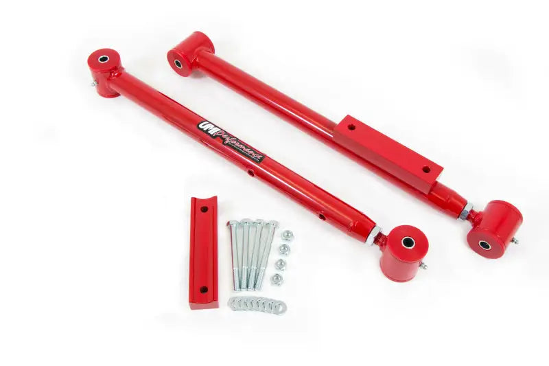 Red adjustable extended length lower control arms with hardware for UMI Performance Impala SS