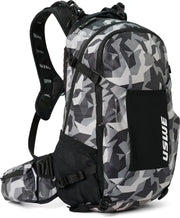 USWE Shred MTB daypack with camo black design, padded straps, and waist belt