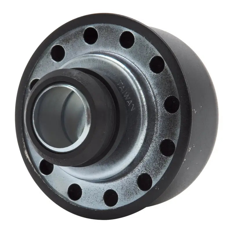 Black and silver valve cover breather with holes for engine ventilation
