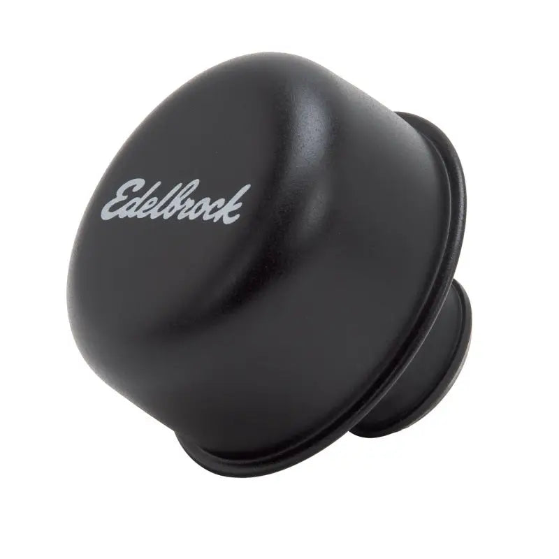Black Edelbrock carburetor air cleaner for valve cover breather setup