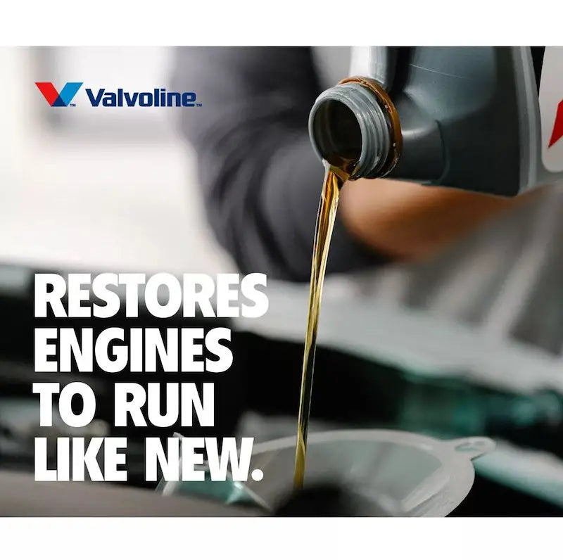 Valvoline 904536 Oil Restore pouring SAE 0W-20 synthetic into funnel — Valvoline 1 qt restores engines
