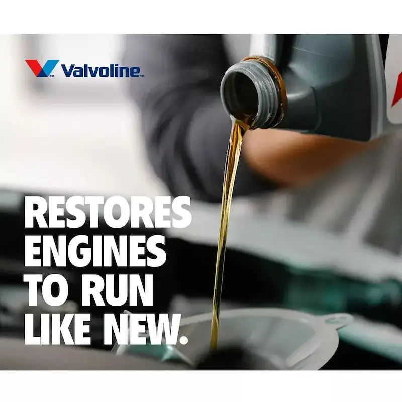 Valvoline 904536 Oil Restore pouring SAE 0W-20 synthetic into funnel — Valvoline 1 qt restores engines