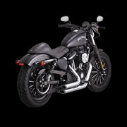 Vance and Hines Shortshots Stagg Pcx Chr exhaust on a sleek black Harley-Davidson motorcycle.