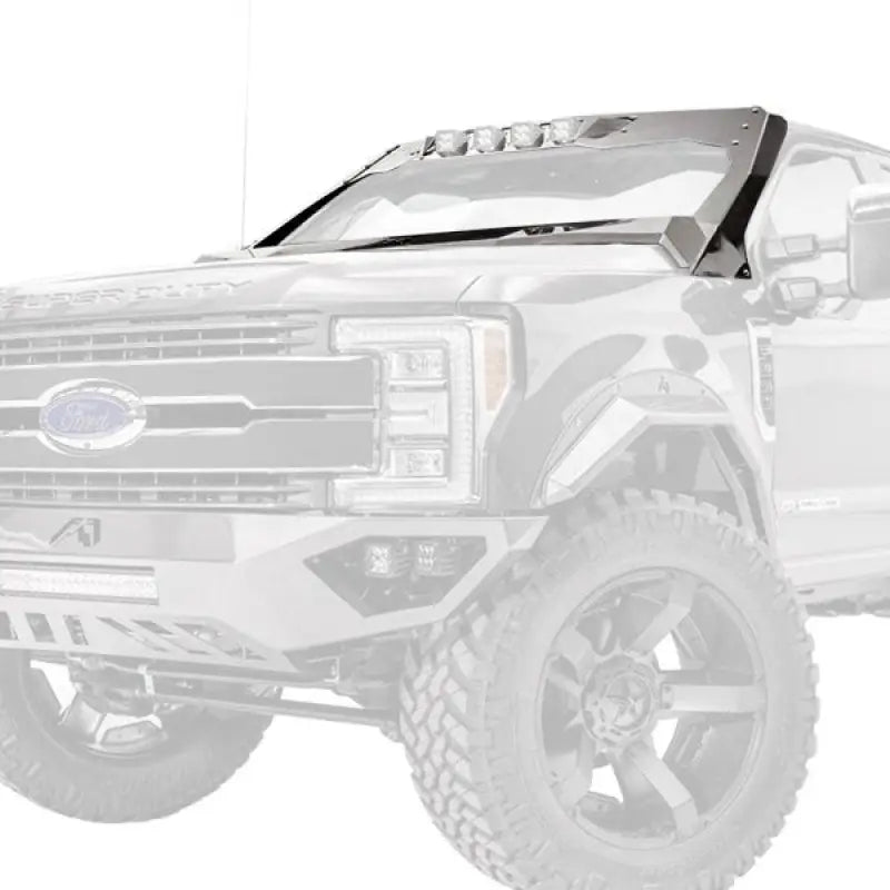 Fab Fours Vicowl 4 Light Insert VC4102-1 mounted on a Ford truck, enhancing off-road visibility and style.