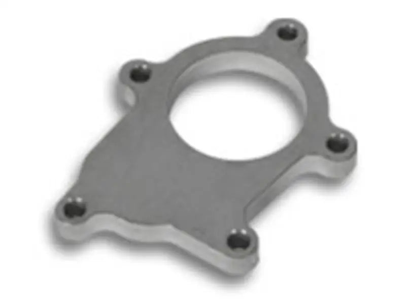 Metal adapter plate with mounting holes.