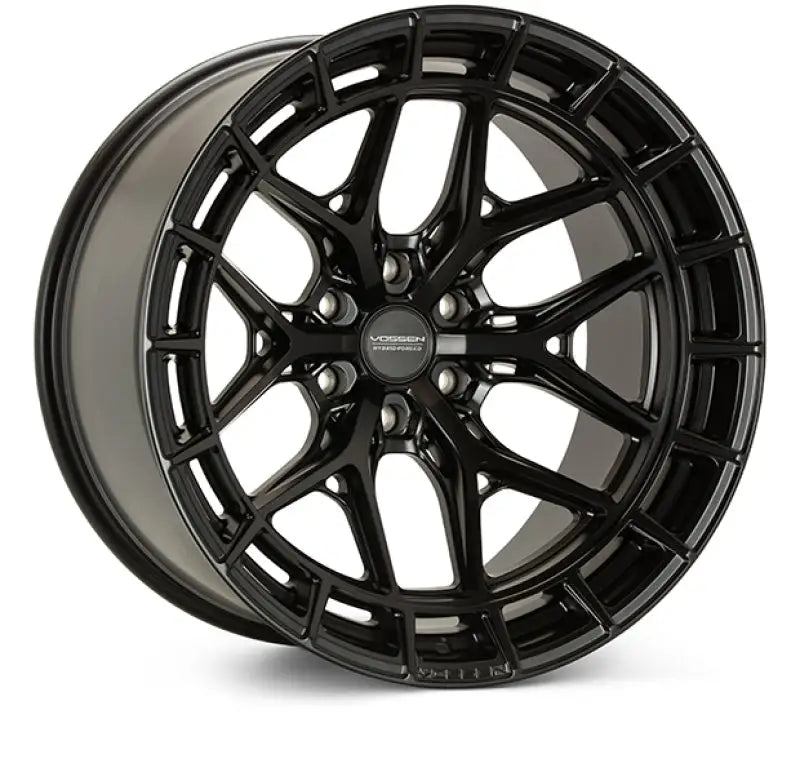 Gloss black super deep alloy wheel with segmented outer rim design, satin black finish