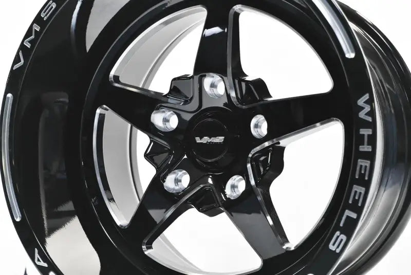 Black five-spoke wheel from VWST060 True Spike VMS Wheels Star series