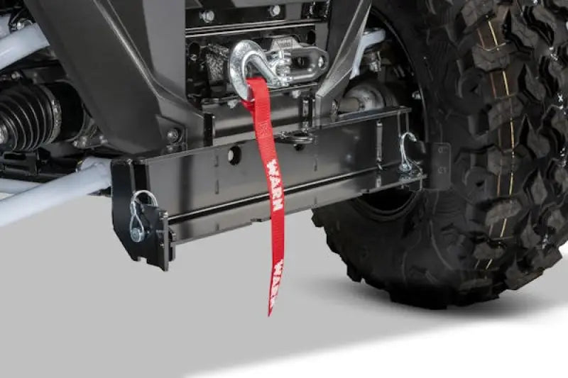 Warn Industries off-road vehicle winch with red strap for KRX1000 UTV plow mount