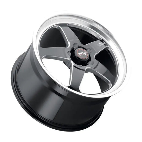 Black and silver five-spoke wheel.