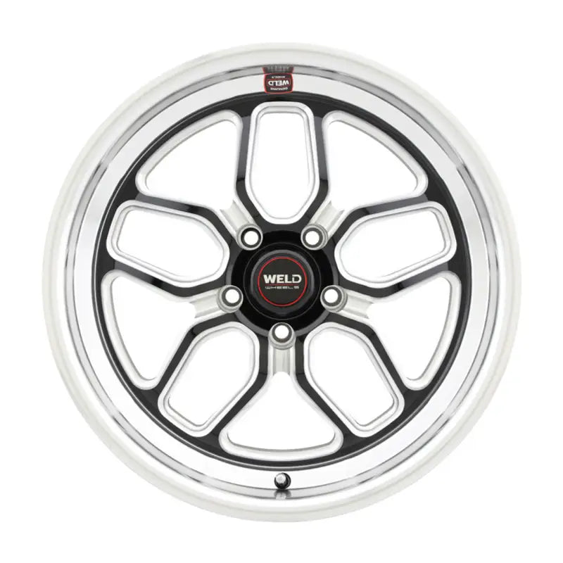 Chrome and black five-spoke wheel.