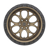 Bronze-colored wheel with a dark gray rim.