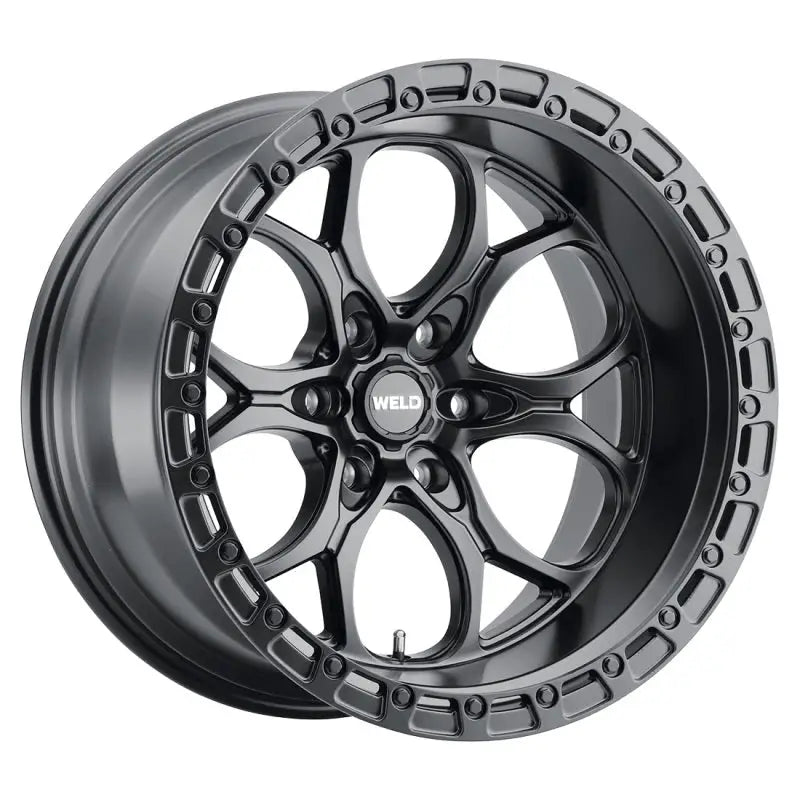 Black aluminum alloy wheel.