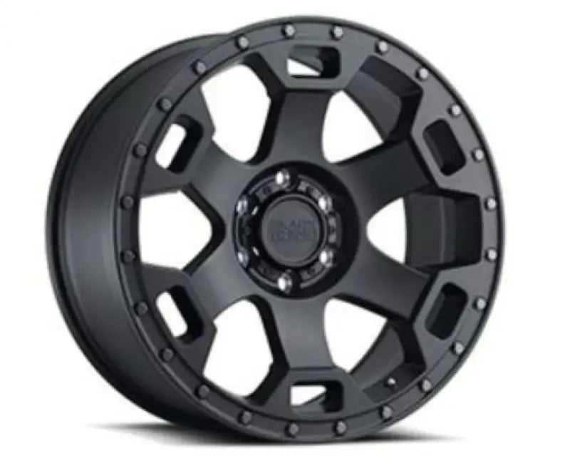 Black alloy wheel from Wheel Pros Black Gauntlet Mountain 18X9 5X150 designed for off-road fun