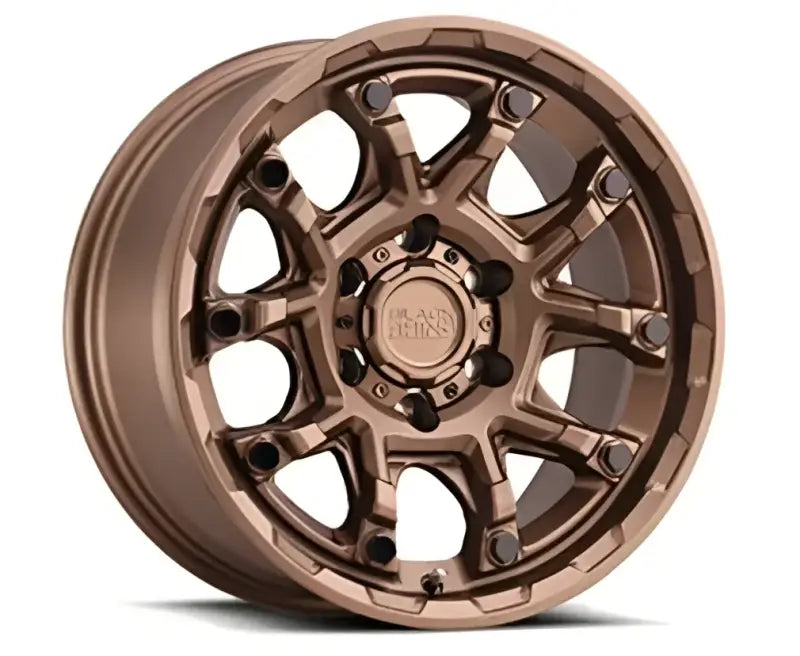 Bronze-colored off-road Wheel Pros Bronze Ark Mountain 17x8.5 5x127 wheel for rugged rides