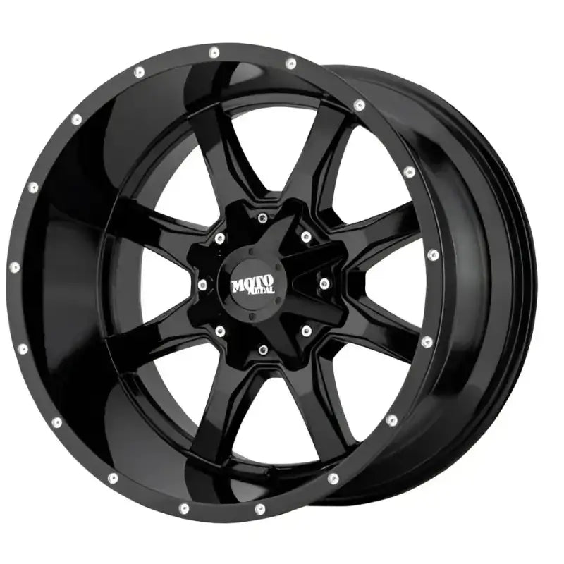 Black glossy Wheel Pros Mo970 20X10 6-Lug wheel with rugged design and silver accents