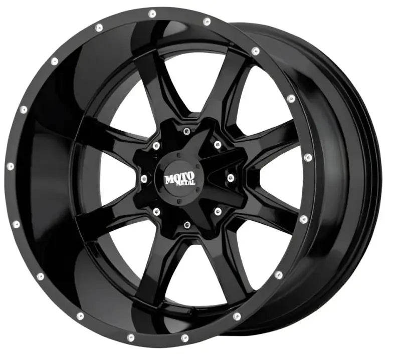 Black glossy Wheel Pros Mo970 20X10 6-Lug wheel with rugged design and silver accents