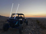 Blue and black off-road vehicle with RGB chase light rod and illuminated whips