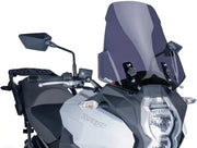 Gray and black motorcycle with tall tinted windscreen touring dark smoke for sleek rides