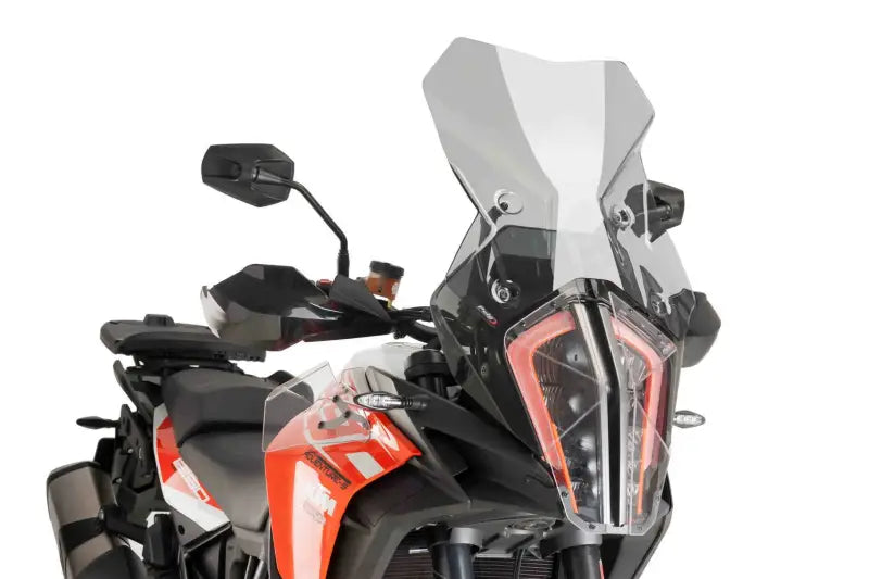 Orange and black motorcycle with windscreen touring smoke for Touring Smoke KTM bikes