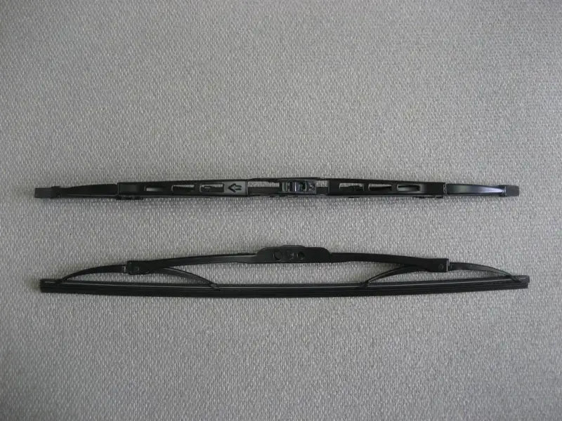 WT1-18 AP Products 18' universal contour blade assembly, black metal frame, black rubber blade, 18 inches in length, featured against a textured gray background.