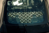 Ford Mustang package tray with patterned covering in rear window for style and protection