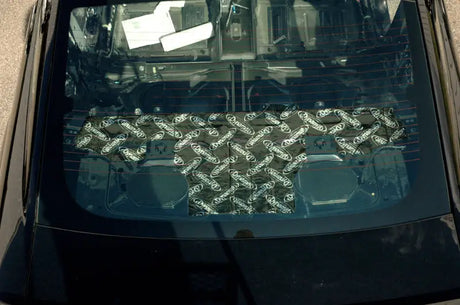 Ford Mustang package tray with patterned covering in rear window for style and protection