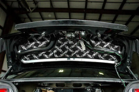 Ford Mustang trunk with sound dampening material from XFO M5 T Dynamat kit
