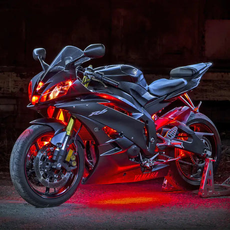 Black Yamaha R6 motorcycle lit up with red lights from XK Glow LED strip kit
