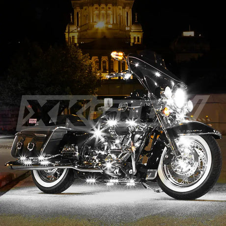 Illuminated black motorcycle with XK Glow White LED Strip Kit for cool vibes