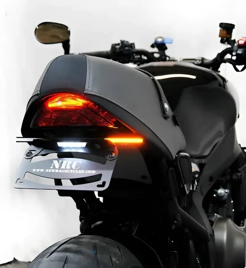 Fender Eliminator with LED tail light for Yamaha XSR, featuring integrated turn signals and license plate bracket by NRC.