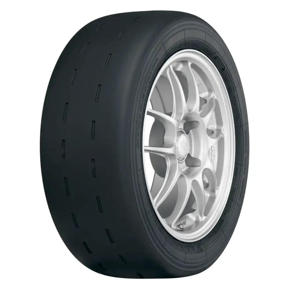 Black racing slick tire with silver multi-spoke wheel on Yokohama Advan A055 tire