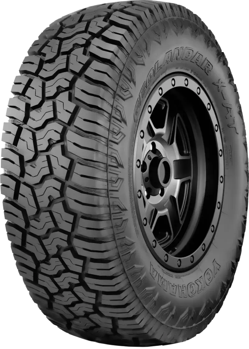 Off-road Yokohama Geolandar X-AT tire with aggressive tread pattern for rugged driving
