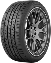 Car tire with intricate tread pattern and alloy wheel showcasing Yokohama Geolandar X-CV design