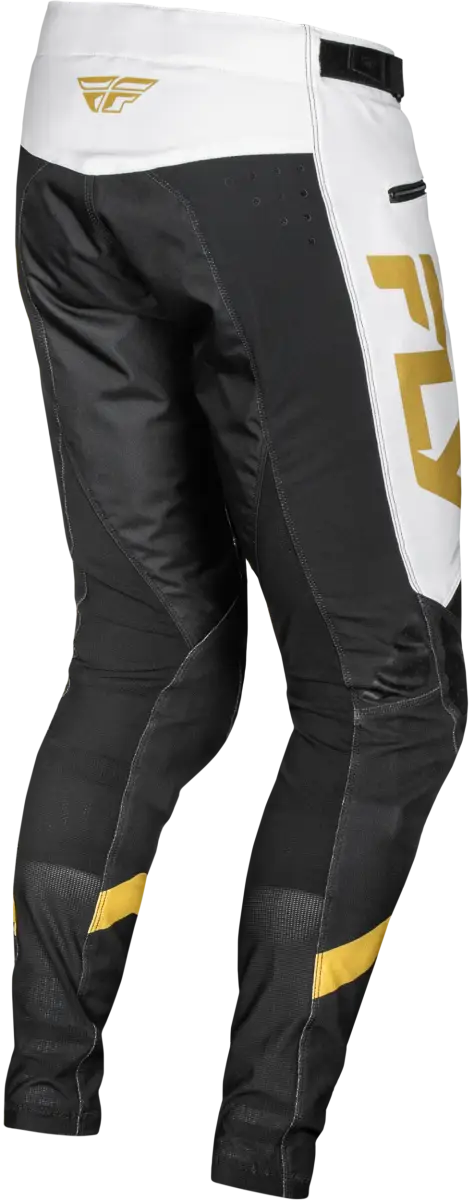 Youth Rayce Bicycle Pants with black and white motocross style and gold accents featuring durable stretch technology
